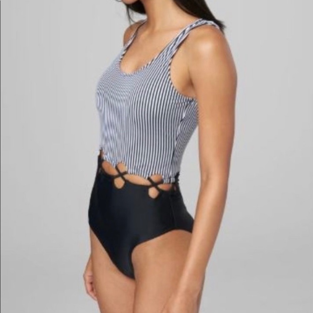 Bebe Laced, Striped Block Swimsuit.